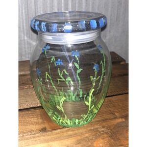Hand painted glass jar with a lid